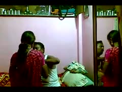 In a white reservoir top, a horn-mad Indian man consumes his wife's foul-smelling love tunnel.